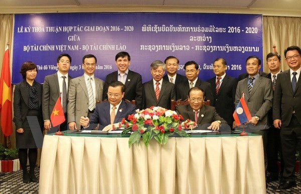 Vietnam y Laos consolidan cooperación financiera ảnh 1 Vietnam y Laos consolidan cooperación financiera ảnh 1
