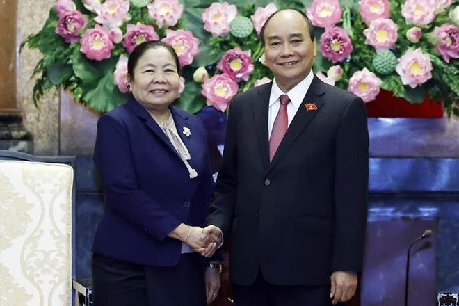 Presidente de Vietnam recibe a dirigente partidista de Laos ảnh 1 Presidente de Vietnam recibe a dirigente partidista de Laos ảnh 1