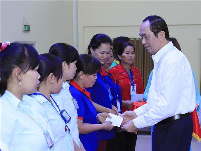 Presidente vietnamita reconoce esfuerzos para mejorar la vida de los obreros ảnh 1 Presidente vietnamita reconoce esfuerzos para mejorar la vida de los obreros ảnh 1