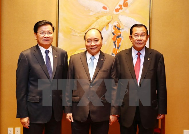 Primer ministro de Vietnam se reúne con homólogos de Laos y Camboya ảnh 1 Primer ministro de Vietnam se reúne con homólogos de Laos y Camboya ảnh 1