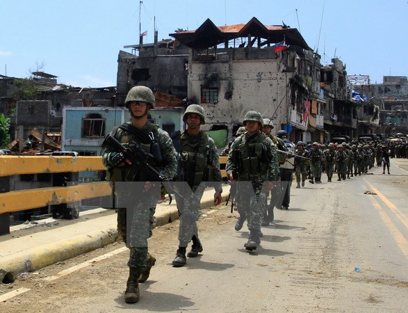 Ejército filipino sostuvo enfrentamientos con grupo insurgente Abu Sayyaf ảnh 1 Ejército filipino sostuvo enfrentamientos con grupo insurgente Abu Sayyaf ảnh 1