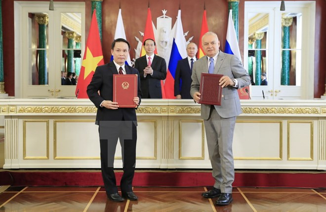 VNA y agencia de información rusa Sputnik fortalecen cooperación ảnh 1 VNA y agencia de información rusa Sputnik fortalecen cooperación ảnh 1