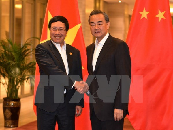 Vicepremier y canciller vietnamita se reúne con jefe de diplomacia china ảnh 1 Vicepremier y canciller vietnamita se reúne con jefe de diplomacia china ảnh 1