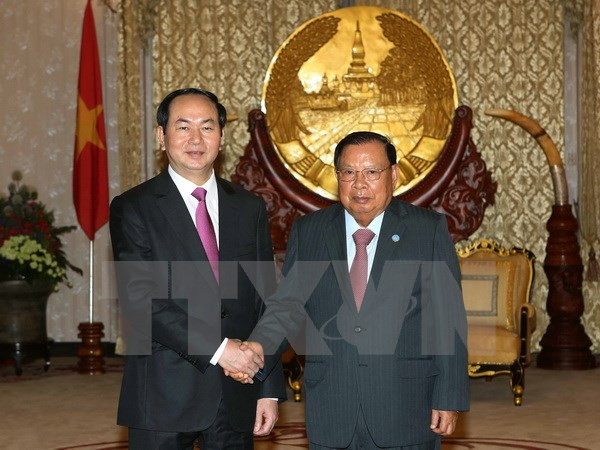 Visita a Laos del presidente de Vietnam capta especial atención de prensa ảnh 1 Visita a Laos del presidente de Vietnam capta especial atención de prensa ảnh 1