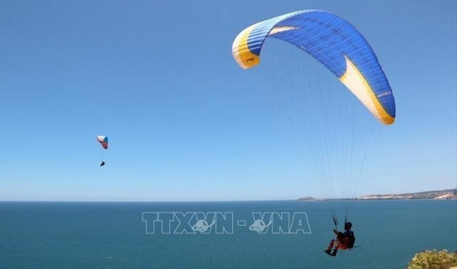 Experimentan parapente aventura única en provincia vietnamita de Binh Thuan ảnh 1 Experimentan parapente aventura única en provincia vietnamita de Binh Thuan ảnh 1