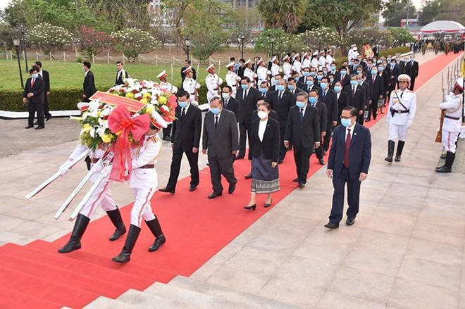 Celebra Laos aniversario 65 de la fundación del Partido Popular Revolucionario ảnh 1 Celebra Laos aniversario 65 de la fundación del Partido Popular Revolucionario ảnh 1