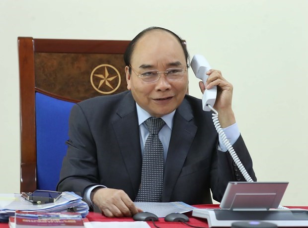 Premier vietnamita mantiene conversaciones telefónicas con homólogos de Laos y Camboya ảnh 1 Premier vietnamita mantiene conversaciones telefónicas con homólogos de Laos y Camboya ảnh 1