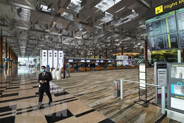 Asisten a vietnamitas varados en aeropuerto de Singapur ảnh 1 Asisten a vietnamitas varados en aeropuerto de Singapur ảnh 1