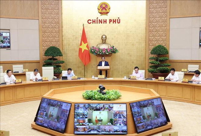 Premier vietnamita preside reunión ordinaria del Gabinete de marzo ảnh 1
