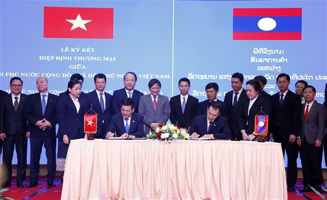 Vietnam y Laos firman nuevo acuerdo comercial ảnh 1 Vietnam y Laos firman nuevo acuerdo comercial ảnh 1