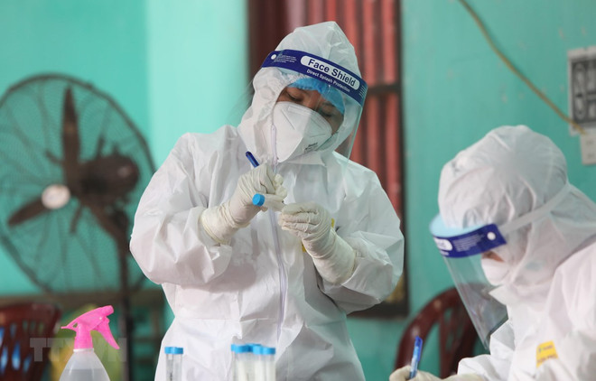 Otros 21 casos confirmados del COVID-19 en Vietnam ảnh 1
