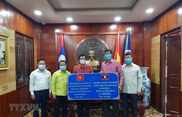Provincias laosianas se unen a esfuerzos de Vietnam en lucha contra COVID-19 ảnh 1 Provincias laosianas se unen a esfuerzos de Vietnam en lucha contra COVID-19 ảnh 1