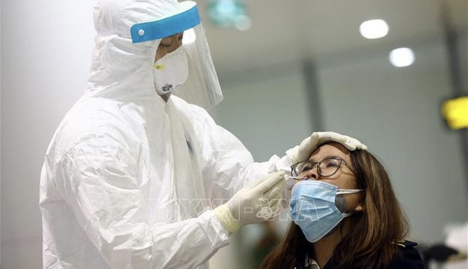 Hanoi realizará pruebas aleatorias del COVID-19 a viajeros en aeropuerto de Noi Bai ảnh 1 Hanoi realizará pruebas aleatorias del COVID-19 a viajeros en aeropuerto de Noi Bai ảnh 1