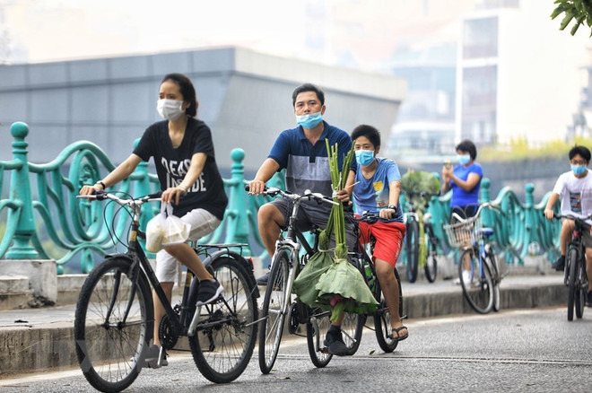 Bicicleta resurge como medio de transporte en Hanoi en época pandémica ảnh 1 Bicicleta resurge como medio de transporte en Hanoi en época pandémica ảnh 1