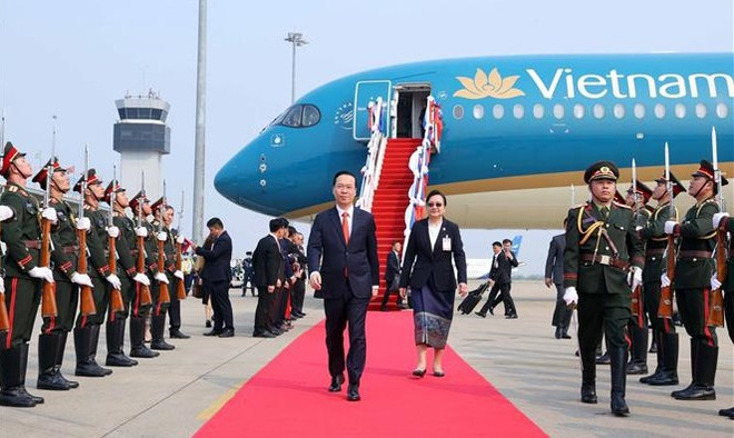Presidente de Vietnam llega a Vientiane para iniciar su visita oficial a Laos ảnh 2 Presidente de Vietnam llega a Vientiane para iniciar su visita oficial a Laos ảnh 2