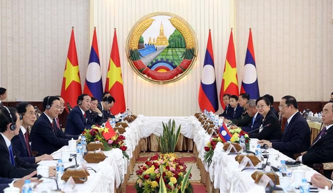 Presidente de Vietnam concluye su visita oficial a Laos ảnh 1 Presidente de Vietnam concluye su visita oficial a Laos ảnh 1
