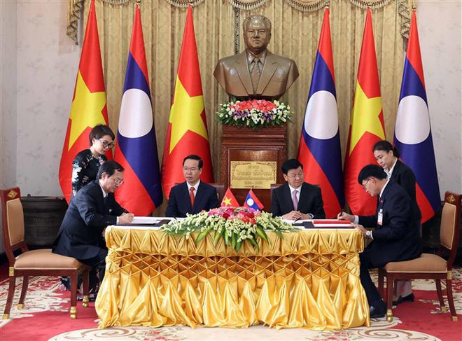 Presidente de Vietnam concluye su visita oficial a Laos ảnh 2 Presidente de Vietnam concluye su visita oficial a Laos ảnh 2