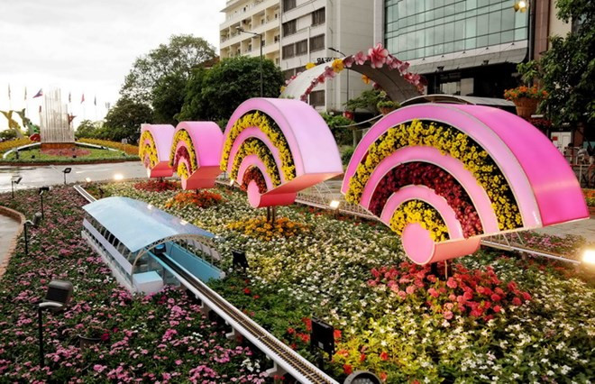 Abierta calle floral Nguyen Hue en Ciudad Ho Chi Minh en días festivos del Tet ảnh 1 Abierta calle floral Nguyen Hue en Ciudad Ho Chi Minh en días festivos del Tet ảnh 1