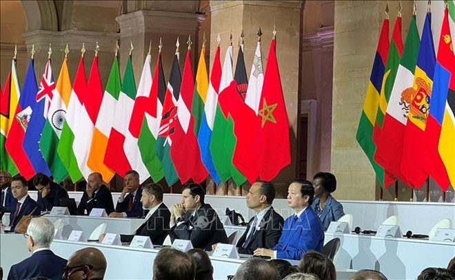 Vicepremier vietnamita asiste a clausura de cumbre del pacto financiero global ảnh 1