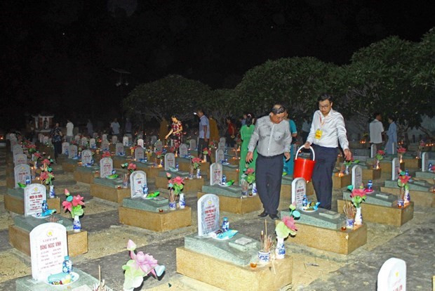 Celebran gran réquiem en homenaje a mártires vietnamitas caídos en Laos ảnh 1
