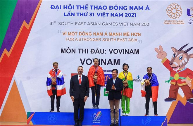 SEA Games 31: Equipo vietnamita de arte marcial Vovinam defiende con éxito su primer puesto ảnh 2