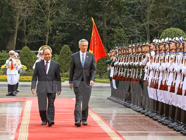 Premier singapurense concluye visita a Vietnam ảnh 1