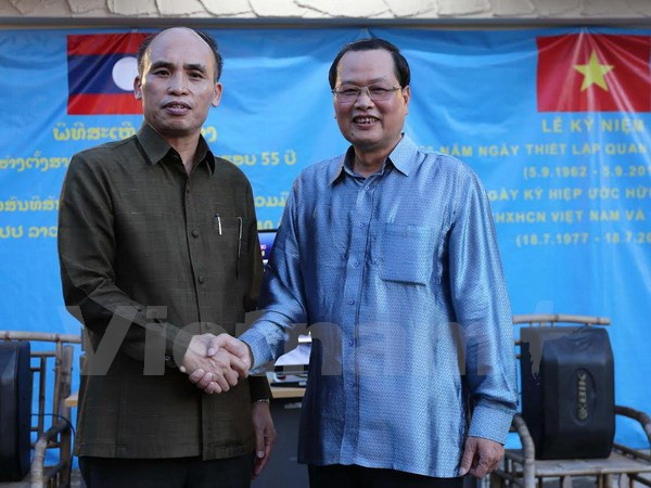 Embajadas de Vietnam y Laos en Singapur celebran encuentro de amistad ảnh 1 Embajadas de Vietnam y Laos en Singapur celebran encuentro de amistad ảnh 1