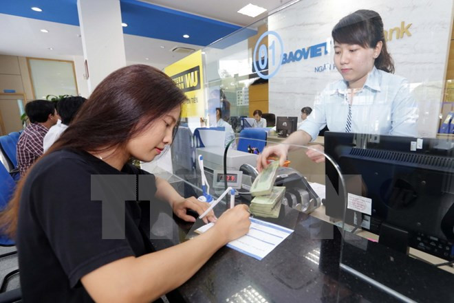 Vietnam podrá alcanzar crecimiento crediticio de 18 a 20 por ciento en 2017 ảnh 1