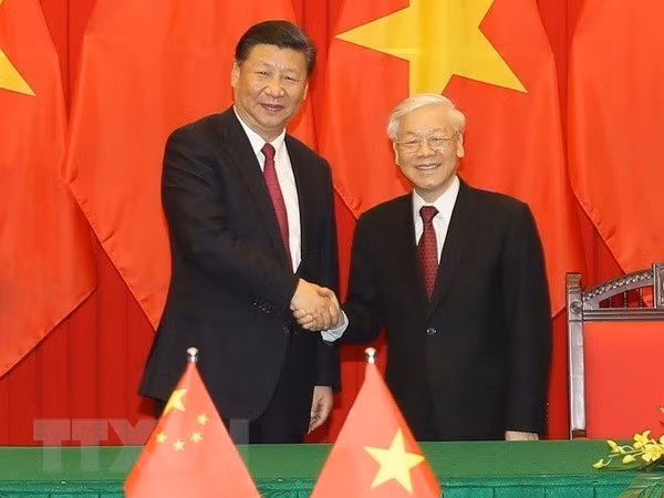 Vietnam y China intercambian mensajes de felicitación en el 71 aniversario de relaciones diplomáticas ảnh 1