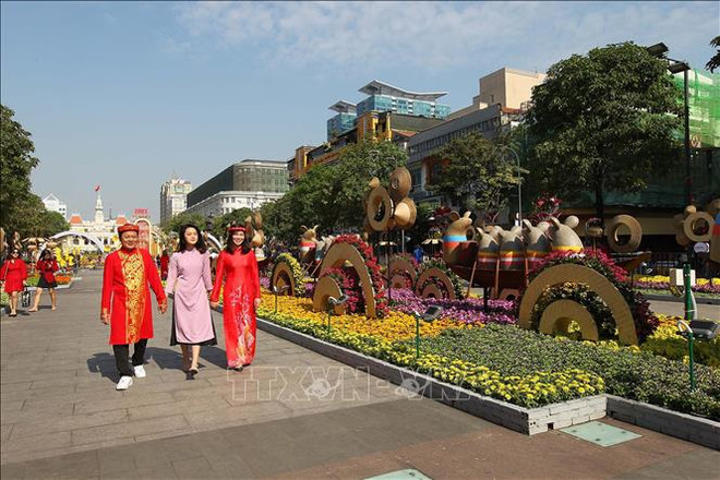 Calle de flores de Nguyen Hue da la bienvenida al Año Nuevo Lunar 2021 ảnh 1 Calle de flores de Nguyen Hue da la bienvenida al Año Nuevo Lunar 2021 ảnh 1