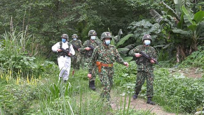 Guardias fronterizas de Vietnam y China refuerzan aplicación de ley en línea limítrofe ảnh 1 Guardias fronterizas de Vietnam y China refuerzan aplicación de ley en línea limítrofe ảnh 1