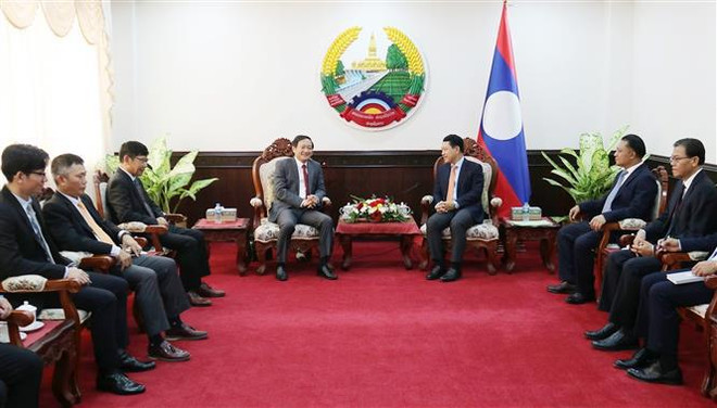 Embajador vietnamita felicita fiesta tradicional Bunpimay de Laos ảnh 1 Embajador vietnamita felicita fiesta tradicional Bunpimay de Laos ảnh 1