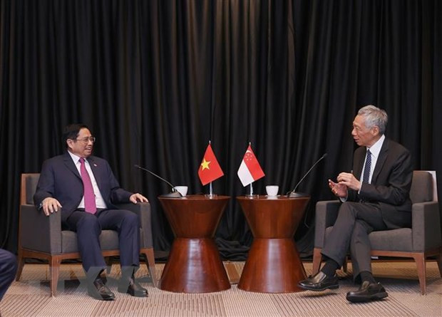 Visita de premier vietnamita a Singapur promueve relaciones bilaterales ảnh 1 Visita de premier vietnamita a Singapur promueve relaciones bilaterales ảnh 1