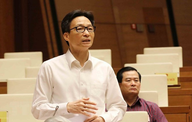 Miembros de Gobierno vietnamita comparecen ante el Parlamento ảnh 1