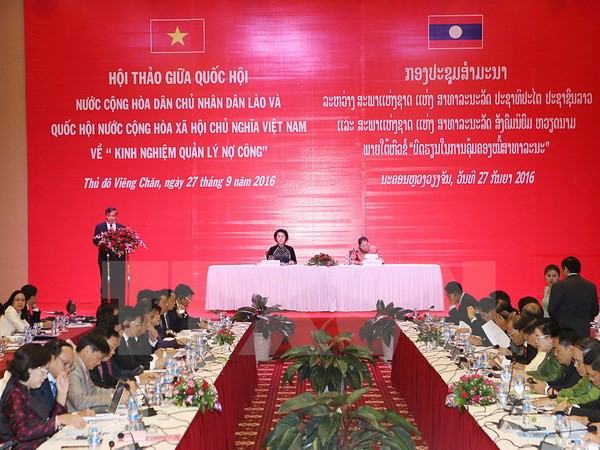 Vietnam y Laos comparten experiencias en la gestión de deuda pública ảnh 1 Vietnam y Laos comparten experiencias en la gestión de deuda pública ảnh 1