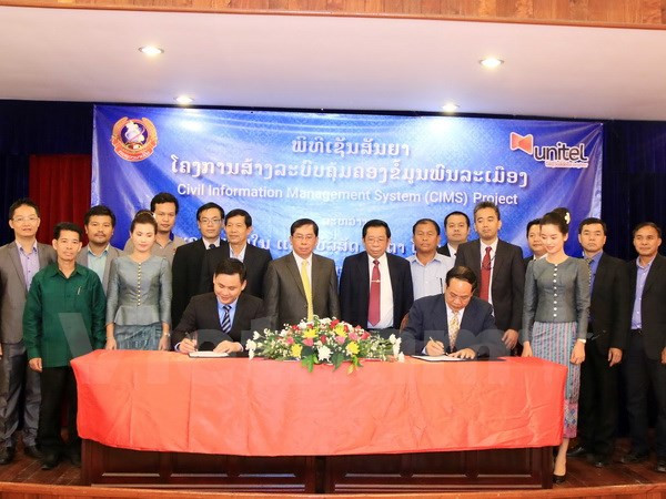 Asistencia vietnamita a Laos en construcción de sistema digital de gestión poblacional ảnh 1