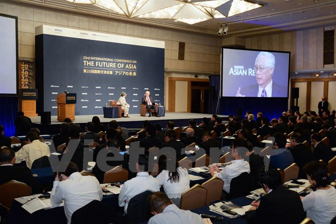 Líderes de grandes empresas debaten futuro económico de Asia ảnh 1