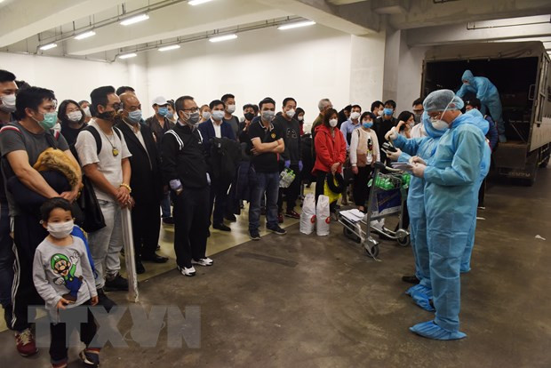 Aplica Hanoi la cuarentena a repatriados de zonas infectadas con COVID-19 ảnh 1