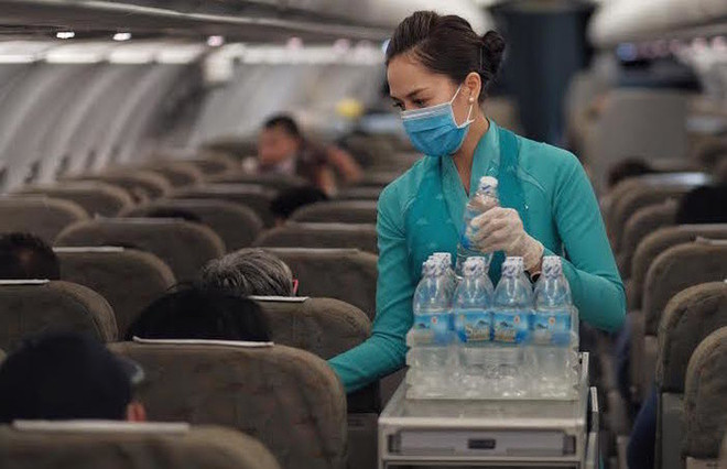 Pasajeros deberán llevar mascarillas sanitarias en vuelos y aeropuertos de Vietnam ảnh 1 Pasajeros deberán llevar mascarillas sanitarias en vuelos y aeropuertos de Vietnam ảnh 1