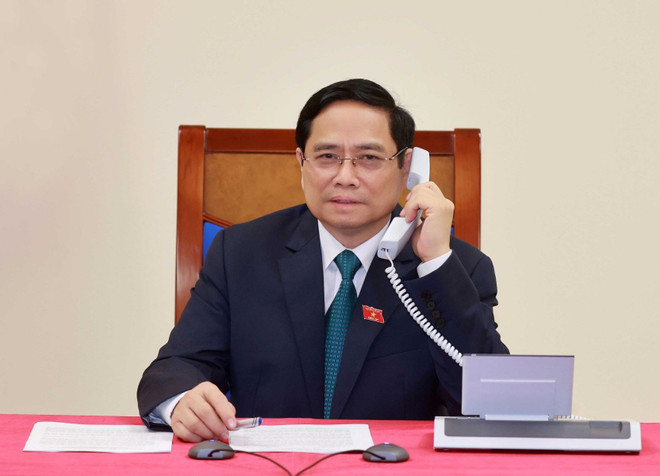 Primer ministro de Laos felicita a su homólogo vietnamita Pham Minh Chinh ảnh 1