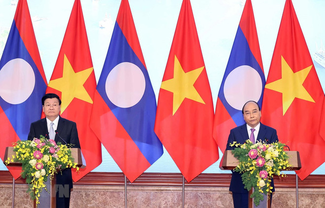 Primer ministro laosiano concluye visita a Vietnam ảnh 1 Primer ministro laosiano concluye visita a Vietnam ảnh 1