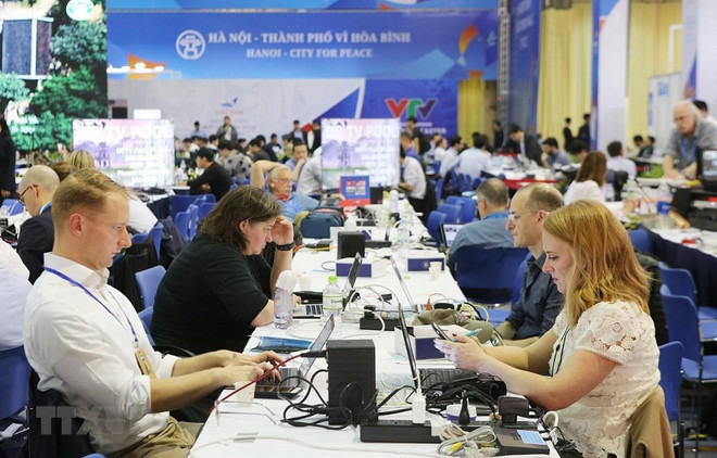 Segunda Cumbre EE.UU.-RPDC, ocasión para que reporteros internacionales conozcan la cultura vietnamita ảnh 1 Segunda Cumbre EE.UU.-RPDC, ocasión para que reporteros internacionales conozcan la cultura vietnamita ảnh 1