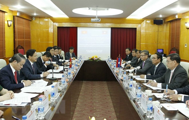 Inspectores generales de Vietnam y Laos comparten experiencias ảnh 1