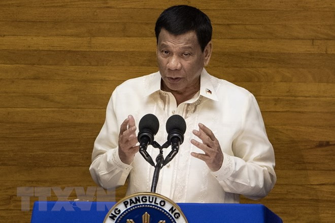 Presidente filipino aprueba ley de autonomía musulmana ảnh 1