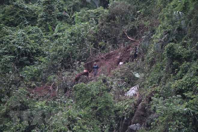Recuperan cadáveres de pilotos en accidente de avión militar en Vietnam ảnh 1 Recuperan cadáveres de pilotos en accidente de avión militar en Vietnam ảnh 1