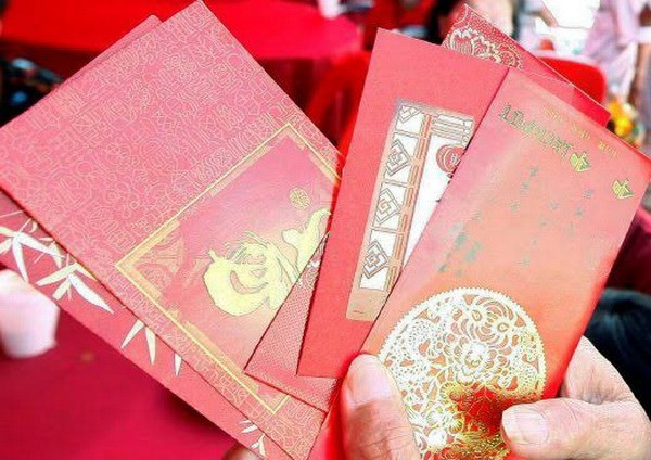  Regalar dinero para buena suerte en el Tet ảnh 1