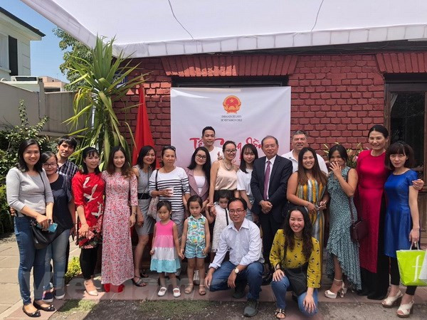 Vietnamitas en Rusia y Chile celebran el tradicional festival de Año Nuevo Lunar ảnh 1