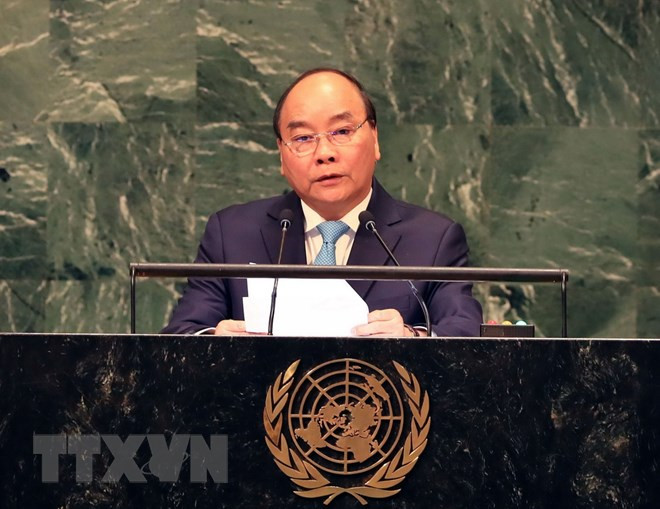  Premier de Vietnam regresa al país tras intensa agenda en la ONU ảnh 1