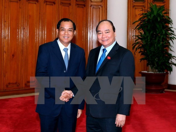 Premier vietnamita exhorta a Laos a facilitar actividades de empresas ảnh 1 Premier vietnamita exhorta a Laos a facilitar actividades de empresas ảnh 1