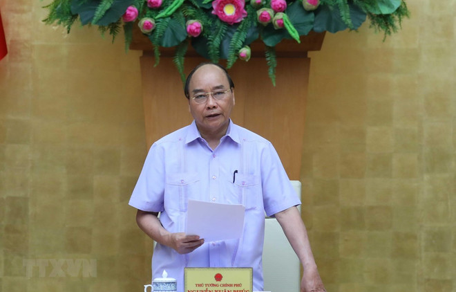 Premier de Vietnam traza orientaciones para mitigación de consecuencias del COVID-19 ảnh 1 Premier de Vietnam traza orientaciones para mitigación de consecuencias del COVID-19 ảnh 1